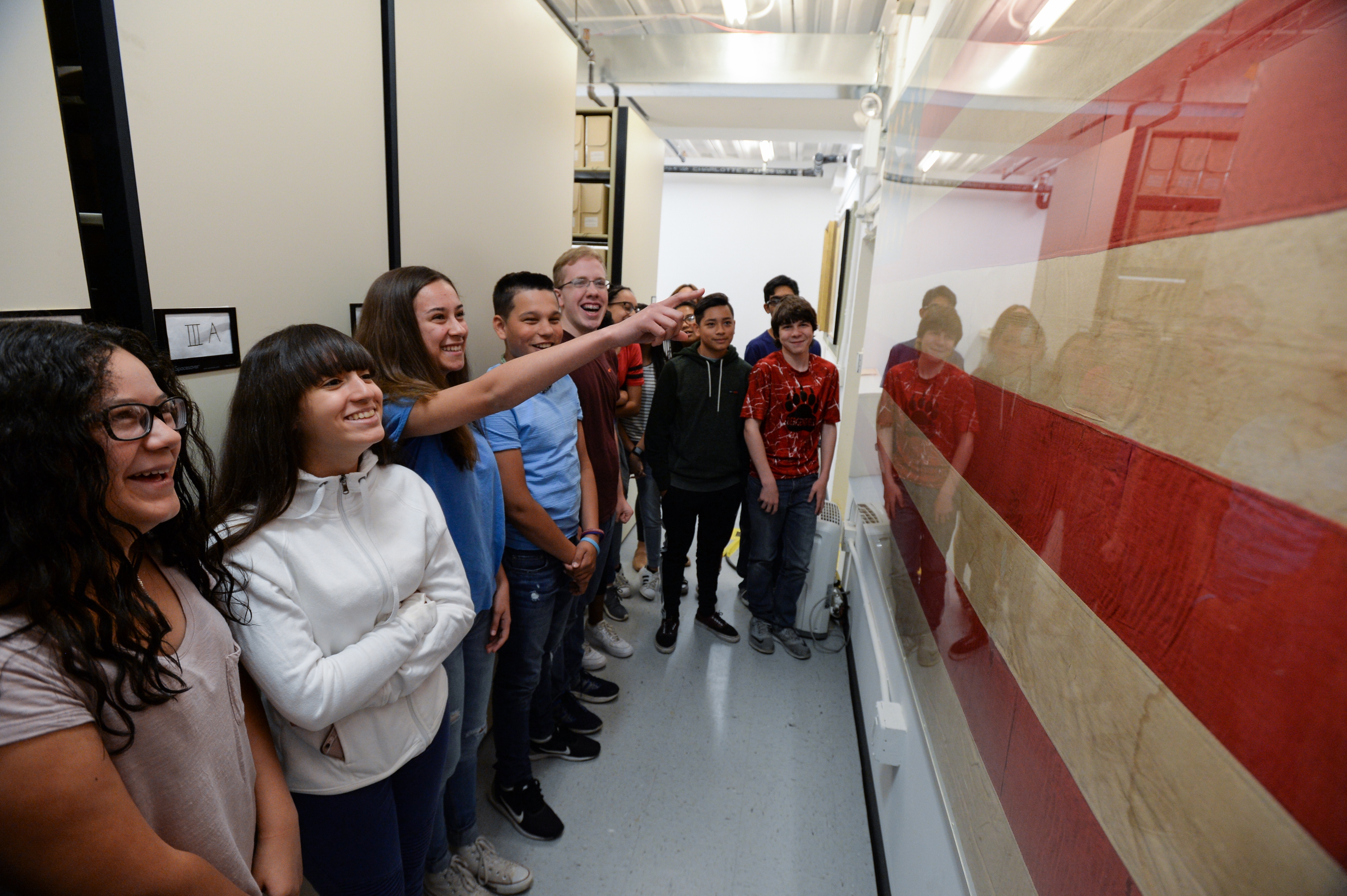 Students from Roy Brown Middle School in Bergenfield, New Jersey, examining a unique abolitionist flag in the Gilder Lehrman Collection