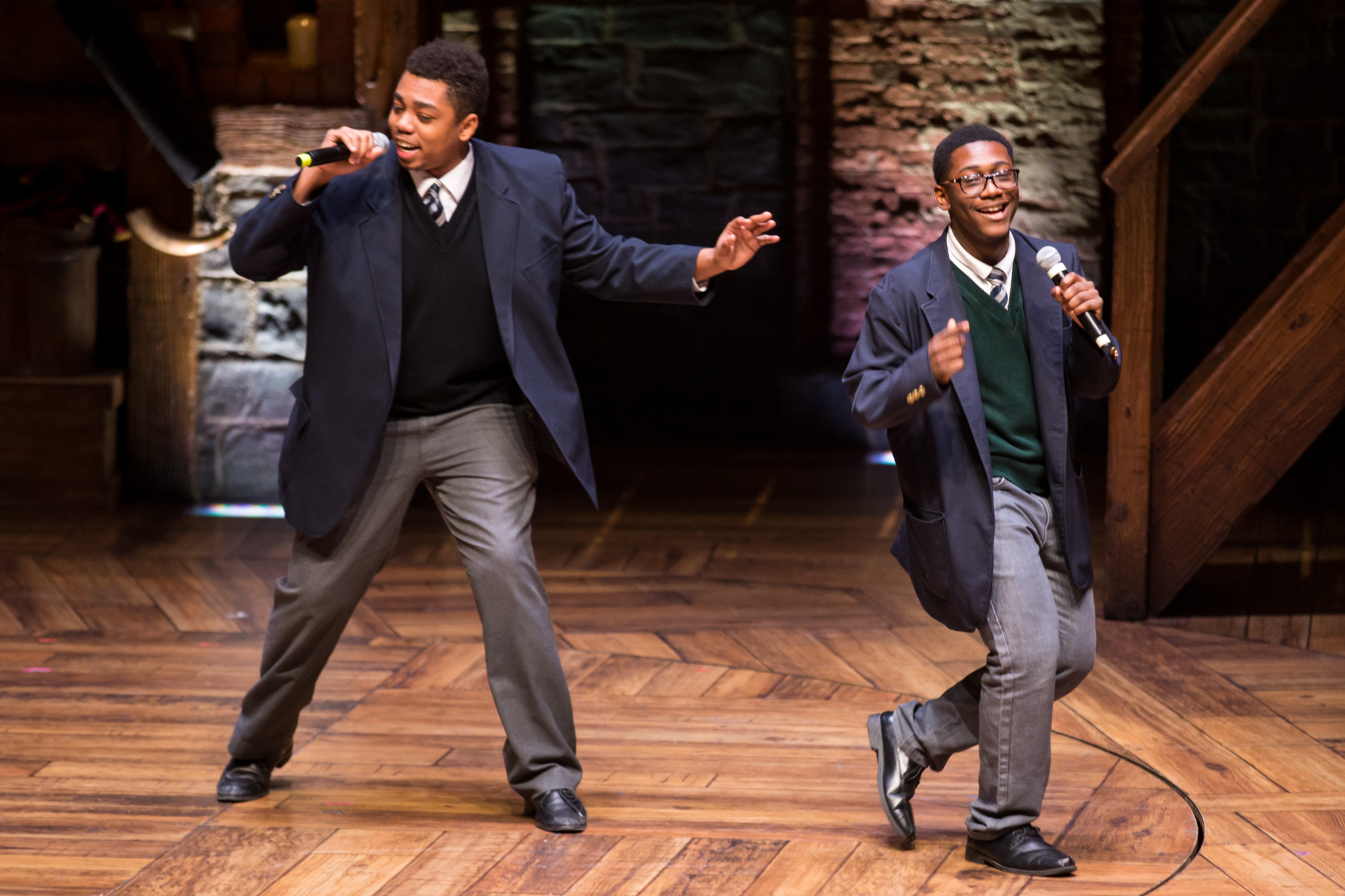 Students Marcus Bornelus and Kendrick Jones performing on stage during a HEP student matinee in Chicago on 02/ 22/17