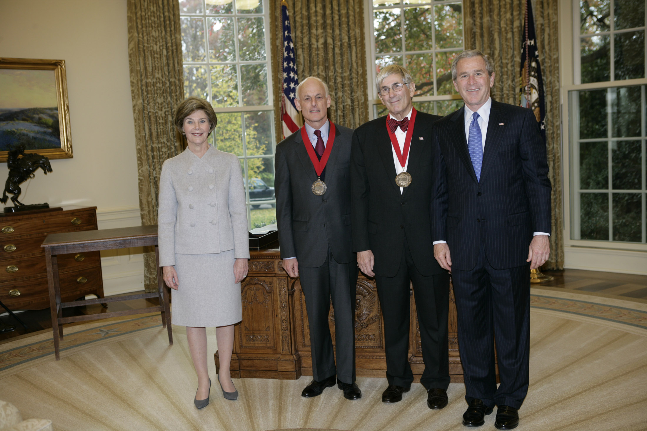 Lewis Lehrman and Richard Gilder receive the 2005 National Humanities Medal at the Whitehouse with President George W. Bush and First Lady Laura Bush