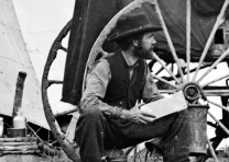 Civil War–era photographer with glass stereo plate, ca. 1864. (Library of Congress Prints and Photographs Division)