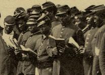 Members of the Louisiana Native Guard in front of the school set up in Port Hudson, Louisiana, for soldiers and freedmen in 1863. (Gilder Lehrman Collection) Louisiana Native Guard in Port Hudson, Louisiana, 1863. (GLC09229)