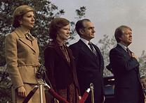 President and Mrs. Carter host the Shah and Shahbanou of Iran, November 1977. (Jimmy Carter Library) The Shah of Iran welcomed by the Carters, 1977. (Jimmy Carter Library)