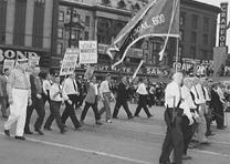 Members of Ford Local 600 of the CIO march in the Labor Day parade in Detroit Michigan, 1942. (Library of Congress Prints and Photographs Division) Ford Local 600 of the CIO in the Labor Day parade in Detroit MI, 1942. (LOC P&P)