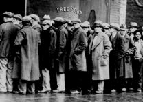 Unemployed men line up outside a soup kitchen in Chicago, February 1931. (National Archives)