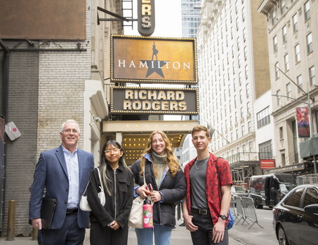Marist Dean of the School of Liberal Arts Martin Shaffer and McCormick Family Foundation-Gilder Lehrman Scholars Elisabet Guerrero Hernandez '25, Olivia Korach '26, and Ethan Roy '26 stand outside the Richard Rodgers Theater ahead of a matinee performance of Hamilton.