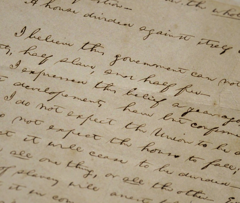 Detail of handwritten notes for Abraham Lincoln's House Divided speech with focus on text "half slave, and half free"