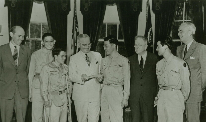 T/Sgt. Kuwayama presenting President Truman with a check contributed by members of the 442nd for a memorial to President Roosevelt [Sept. 11, 1945]