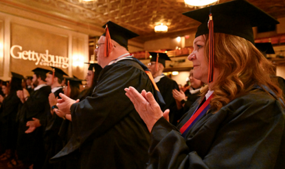 Photograph of graduating MA program students at inaugural Gettysburg commencement ceremony