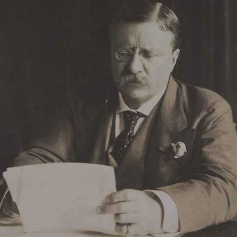 The Era of Theodore Roosevelt (Photo of Theodore Roosevelt sitting, reading a letter)