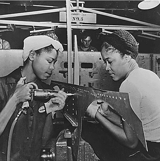 Women and Politics in 20th-Century America (World War II era photo of African American women working as riveters)