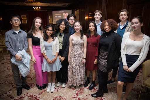 2022 National History Teacher of the Year Misha Matsumoto Yee with Gilder Lehrman Student Advisory Council members at the Harvard Club in New York City for the NHTOY Award Ceremony