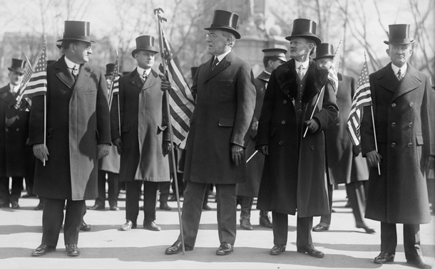 Woodrow Wilson holding an American flag