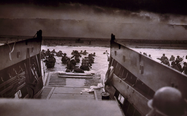 American soldiers wading in water during D-Day invasion