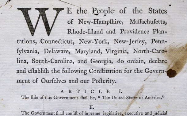 View of rare first printing of the Constitution with notes by Pierce Butler, focused on the preamble