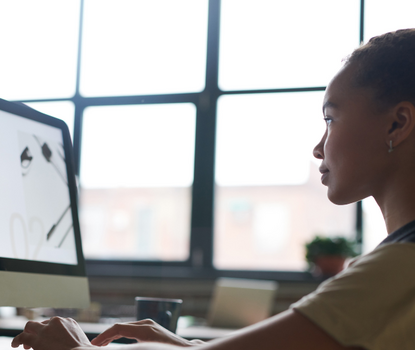 Engaged Student Viewing a Computer Screen