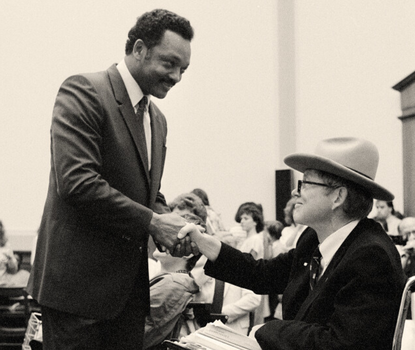 Photo of Jesse Jackson and disability activist.