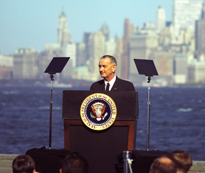 LBJ signs immigration legislation.