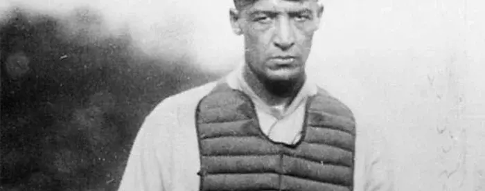  Black-and-white photograph of Louis Santop Loftin in the gear of a catcher.