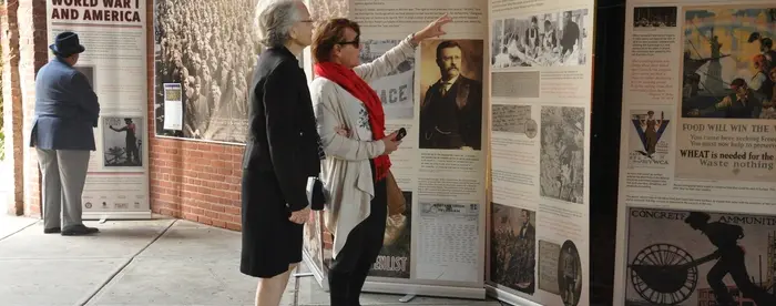 Two people view the WWI exhibition on display