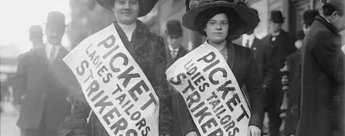 Photograph of two women strikers from Ladies Tailors union on the picket line during the "Uprising of the 20,000," in New York City