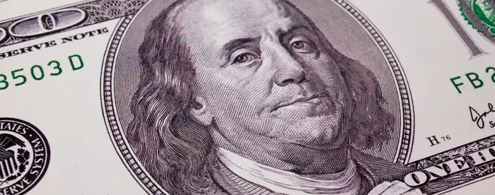 Benjamin Franklin's face on the one hundred dollar bill