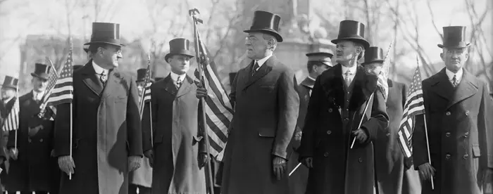 Woodrow Wilson holding an American flag