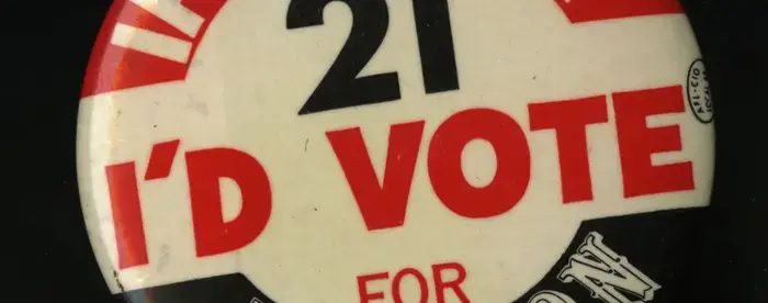 A campaign button reading "If I were 21 I'd vote for Johnson"