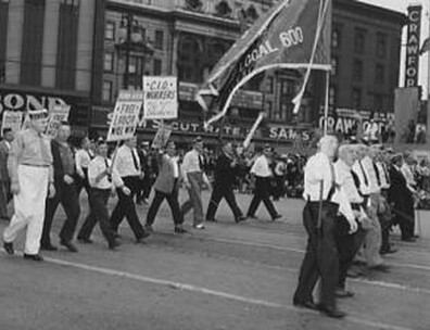 Photograph showing members of Ford Local 600 of the CIO march in the Labor Day parade in Detroit Michigan, 1942.