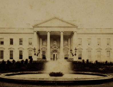 Black and white photograph of the White House from the North Lawn, from 1881