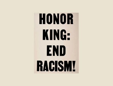 Placard: "Honor King: End Racism!"