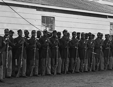 A black and white photograph of a Company E of the 4th United States Colored Troop.